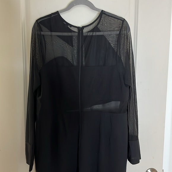 Ladies zip up jumpsuit with a hint of sheer. - Picture 6 of 8